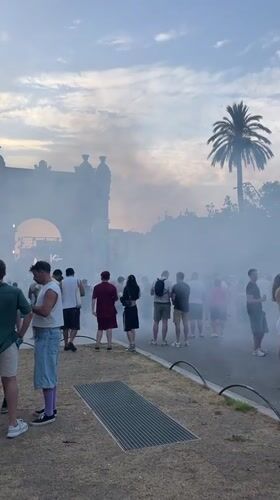 Live music and outdoor event energy near Barcelona's brick archway