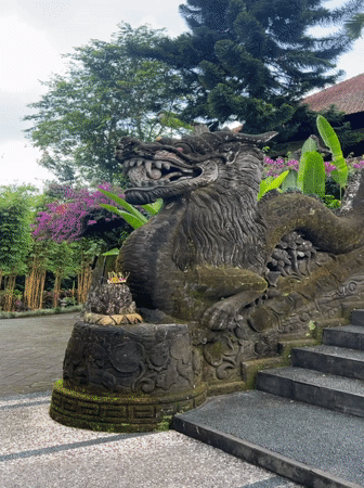 Pigeons and ancient stone sculptures captured in Pupuan, Indonesia