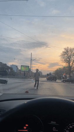 Street juggler performs with clubs in Sofia, Bulgaria