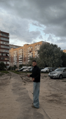 Rainy afternoon in a post-Soviet neighborhood, rainbow included