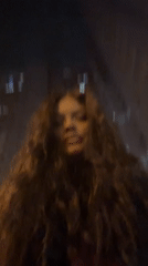 Woman photographed across Krasnogorsk locations, #BeatDrop graphics captured