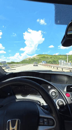 Bridge crossing through Provadia with clear roads and hills
