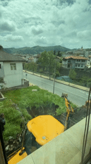 Construction work underway in Zlatograd village with excavator