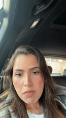 Woman travels through Puebla in evening car journey