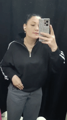 Fitting room try-on selfies during a shopping trip in Chaikovsky