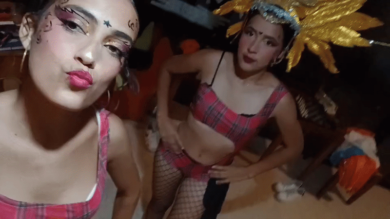Friends take selfies with theatrical makeup in Venezuela beach town