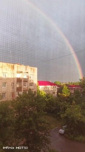 Rainbow over Izhevsk, viewed from a quiet apartment window