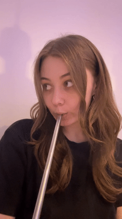 Moscow resident streams soccer match on laptop during evening