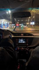 Driver records rainy night journey on Russian highway