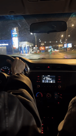 Driver records rainy night journey on Russian highway