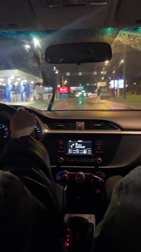 Driver records rainy night journey on Russian highway