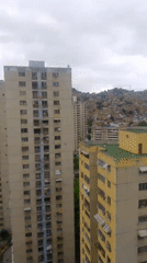 Caracas cityscape documented from high-rise balcony over 30 minutes