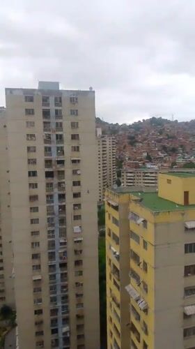 Caracas cityscape documented from high-rise balcony over 30 minutes