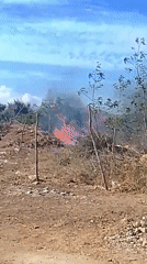 Fire burns in cleared area in Altagracia, Venezuela