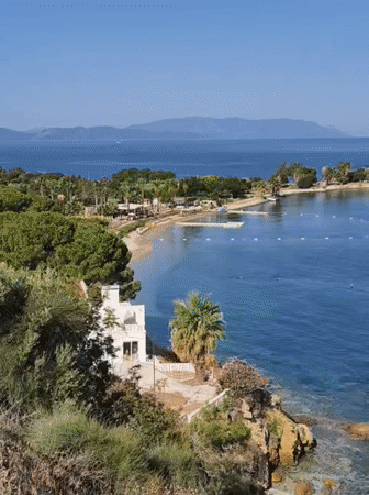Kuşadası landmarks and coastline on a clear summer morning