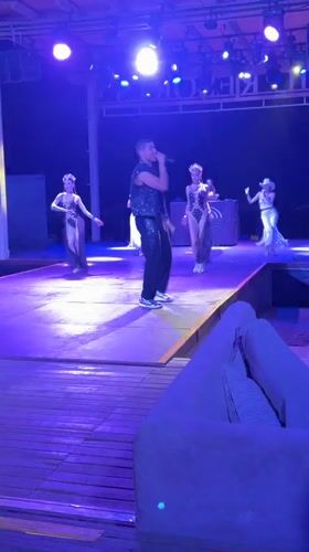 Male singer performs with four dancers in Manavgat, Turkey