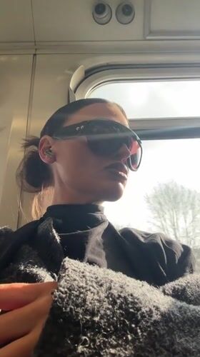 Woman in sunglasses rides public transport in Sevenoaks