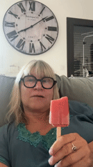 Relaxed afternoon indoors in Chambœuf, popsicle in hand