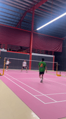 Badminton doubles match played on pink court in Ko Samui