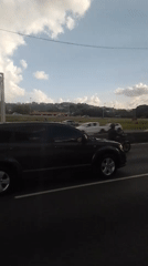 Evening traffic flows through Caracas highways during rush hour