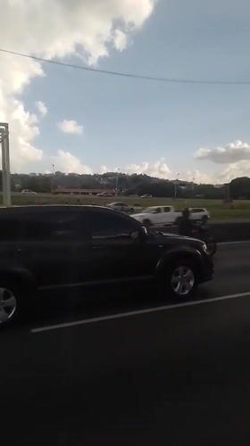 Evening traffic flows through Caracas highways during rush hour