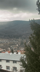 Overcast skies documented over valley town in Bulgaria