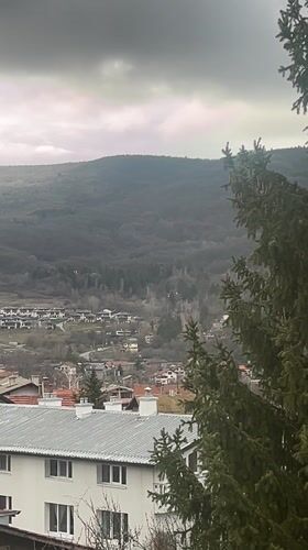 Overcast skies documented over valley town in Bulgaria