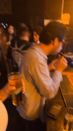 Bar patrons gather for drinks in Puebla, Mexico