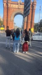 Film crew shoots near Barcelona's Arc de Triomf