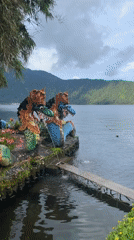 Ornate dragon and frog sculptures spotted at Baturiti lakeside