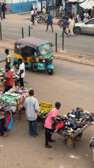 Daily street commerce captured in Bukuru Nigeria afternoon