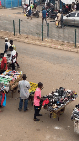 Daily street commerce captured in Bukuru Nigeria afternoon