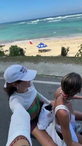 Scooter ride along Bali's clifftop coastal road
