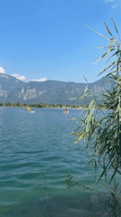 Lazy summer afternoon at Lake Calceranica, Italy