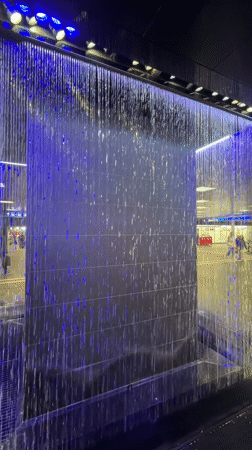 Tourist documents spring morning walk through central Zurich