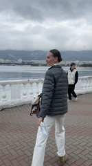 Overcast afternoon brings locals and tourists to Gelendzhik waterfront