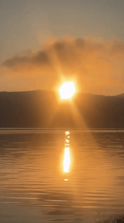 Golden sunrise over Batak Reservoir, Bulgaria