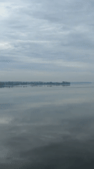 Morning views of Votkinsk Reservoir under cloudy skies documented
