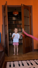 Quiet domestic morning in Khimki — cooking, a parrot, and city views