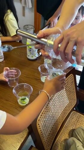 Casual outdoor day in Dujiangyan: drinks, butterflies, and chalk art