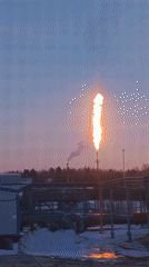 Russian industrial worker documents routine workplace moment with burning flare