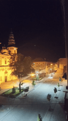 Nighttime town square view captured from elevated position in Ternopil