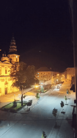 Nighttime town square view captured from elevated position in Ternopil