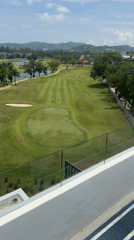 Golf course viewed from elevation in Choeng Thale, Thailand