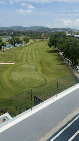 Golf course viewed from elevation in Choeng Thale, Thailand