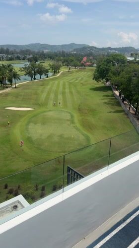 Golf course viewed from elevation in Choeng Thale, Thailand