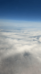 Passenger documents aerial cloud views from aircraft over Sofia
