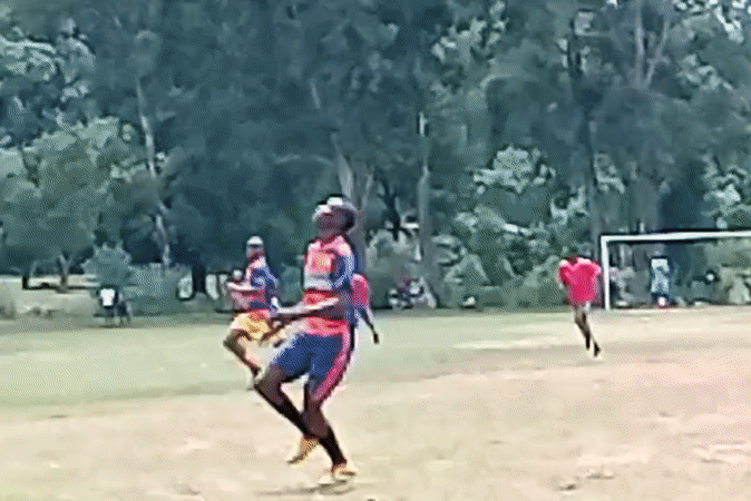 Soccer match played on rural field in Lugari, Kenya