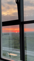 Sunrise or sunset observed through window in Russia