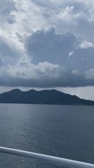 Calm seascape filmed near Ko Tao under cloudy skies